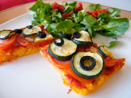 Polenta slices with tomatoes courgette